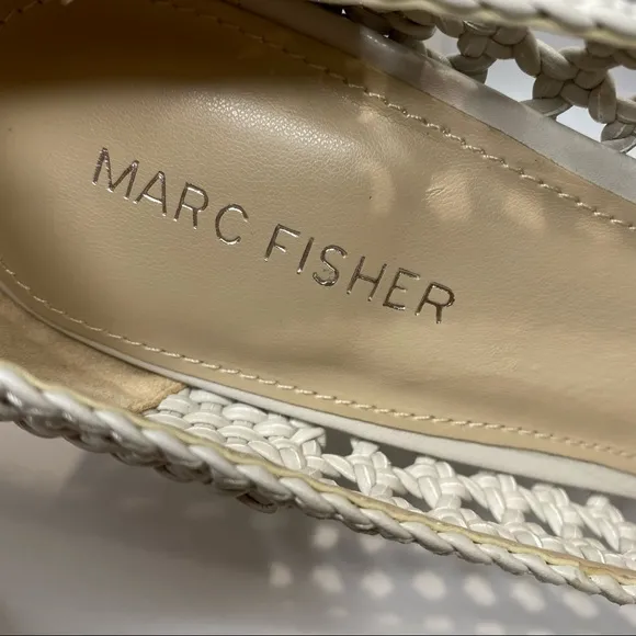 - New MARC FISHER