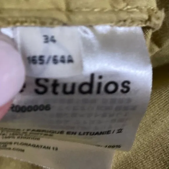 Acne Studios Rowanne Yellow Pleated Cuffed Hem High Waisted Belted Cotton Shorts