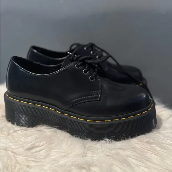 Dr. Martens Black Flats with Glossy Leather and Signature Stitching