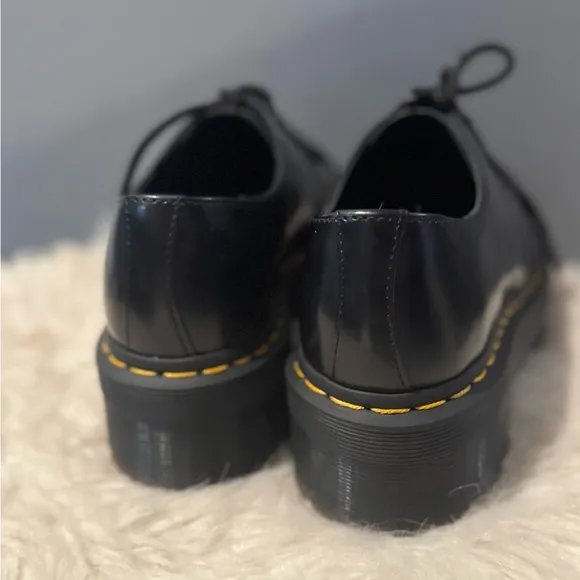 Dr. Martens Black Flats with Glossy Leather and Signature Stitching