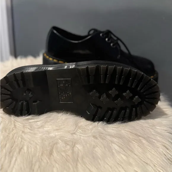 Dr. Martens Black Flats with Glossy Leather and Signature Stitching