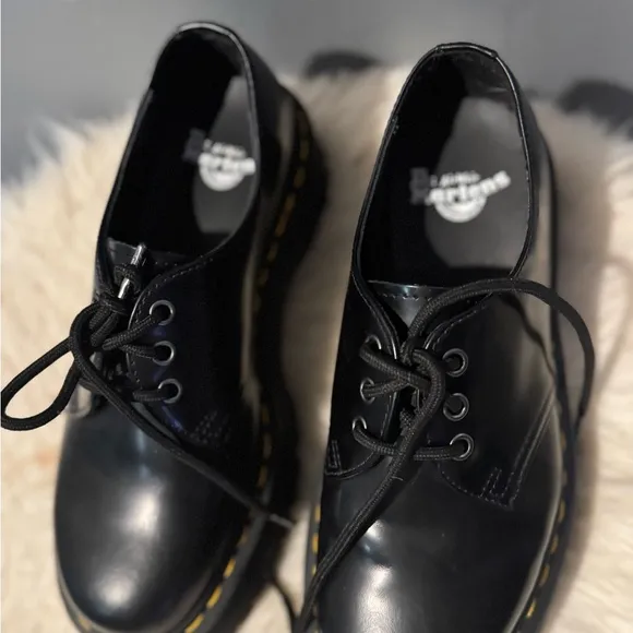Dr. Martens Black Flats with Glossy Leather and Signature Stitching