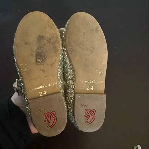 Eli1957 papanatas shoes with gold glitter and bow.