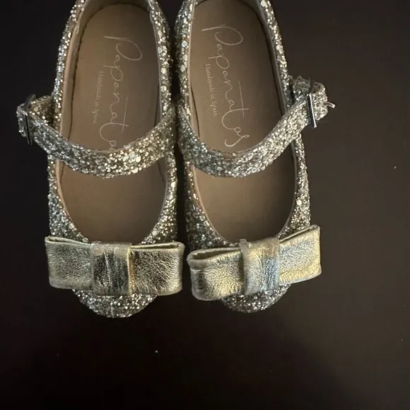 Eli1957 papanatas shoes with gold glitter and bow.