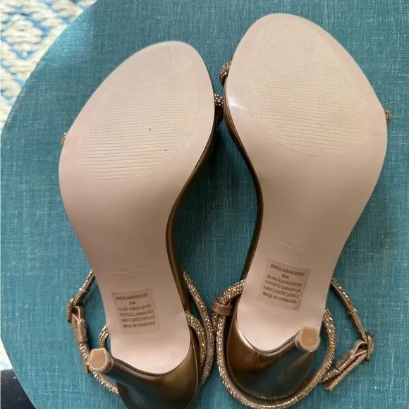 Gorgeous jeweled strappy sandals gold with encrusted jewels straps. 4 inch heel