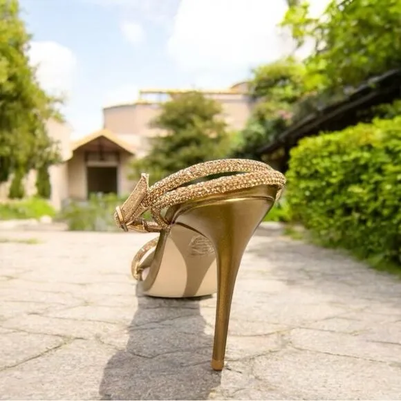 Gorgeous jeweled strappy sandals gold with encrusted jewels straps. 4 inch heel