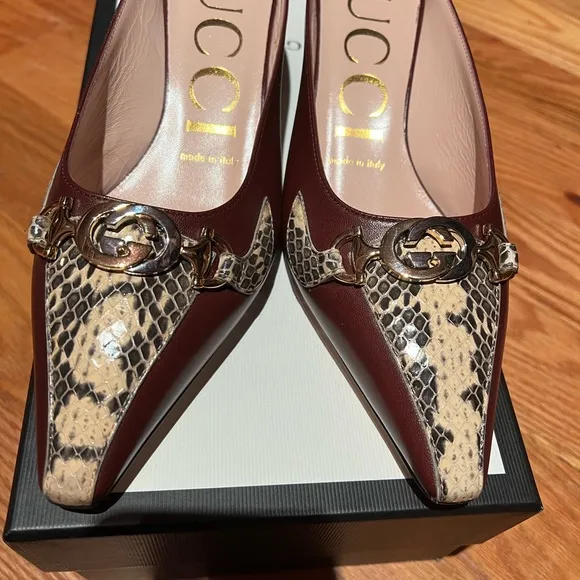 Gucci kitten heel in burgundy with snake skin accents. Size 6