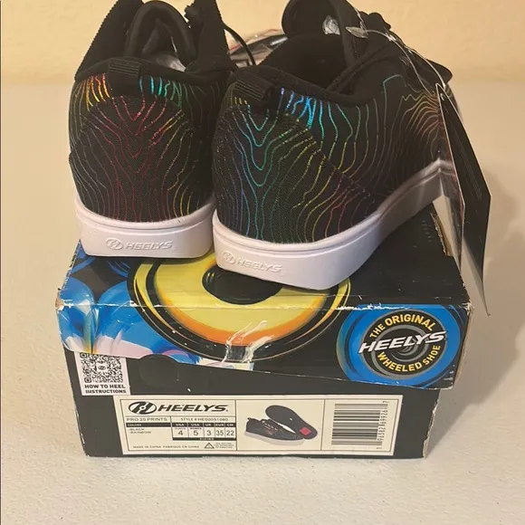 Heelys- NWT in box. Heelys Pro 20 Black and Rainbow. Wheeled Heel Shoes.