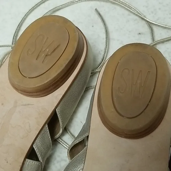 STUART WEITZMAN strappy gold leather sandals