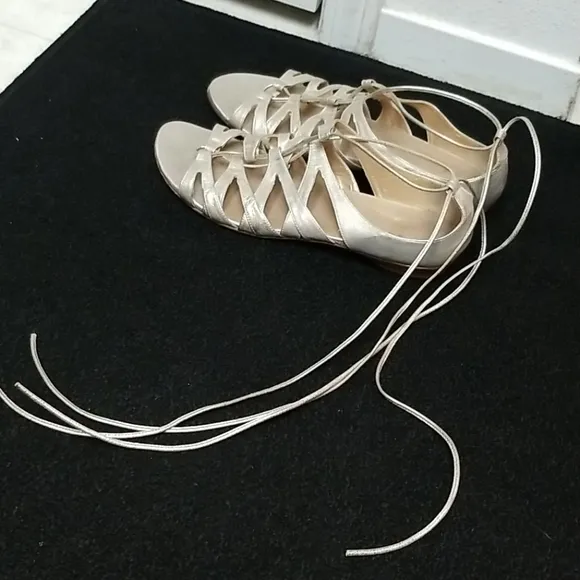 STUART WEITZMAN strappy gold leather sandals