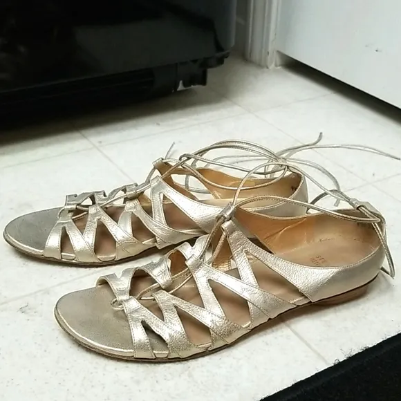 STUART WEITZMAN strappy gold leather sandals