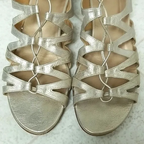 STUART WEITZMAN strappy gold leather sandals
