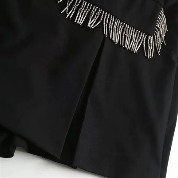 Zara black mini skirt with built in shorts / skort, tassel front pockets