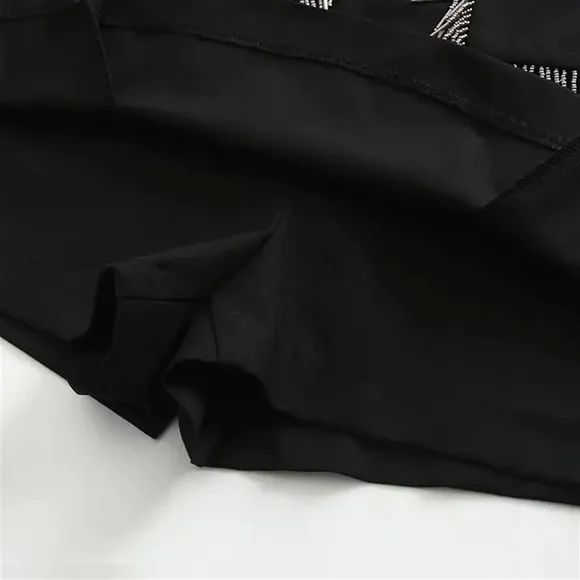 Zara black mini skirt with built in shorts / skort, tassel front pockets